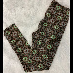 Lularoe One Size Leggings with shades of green.
